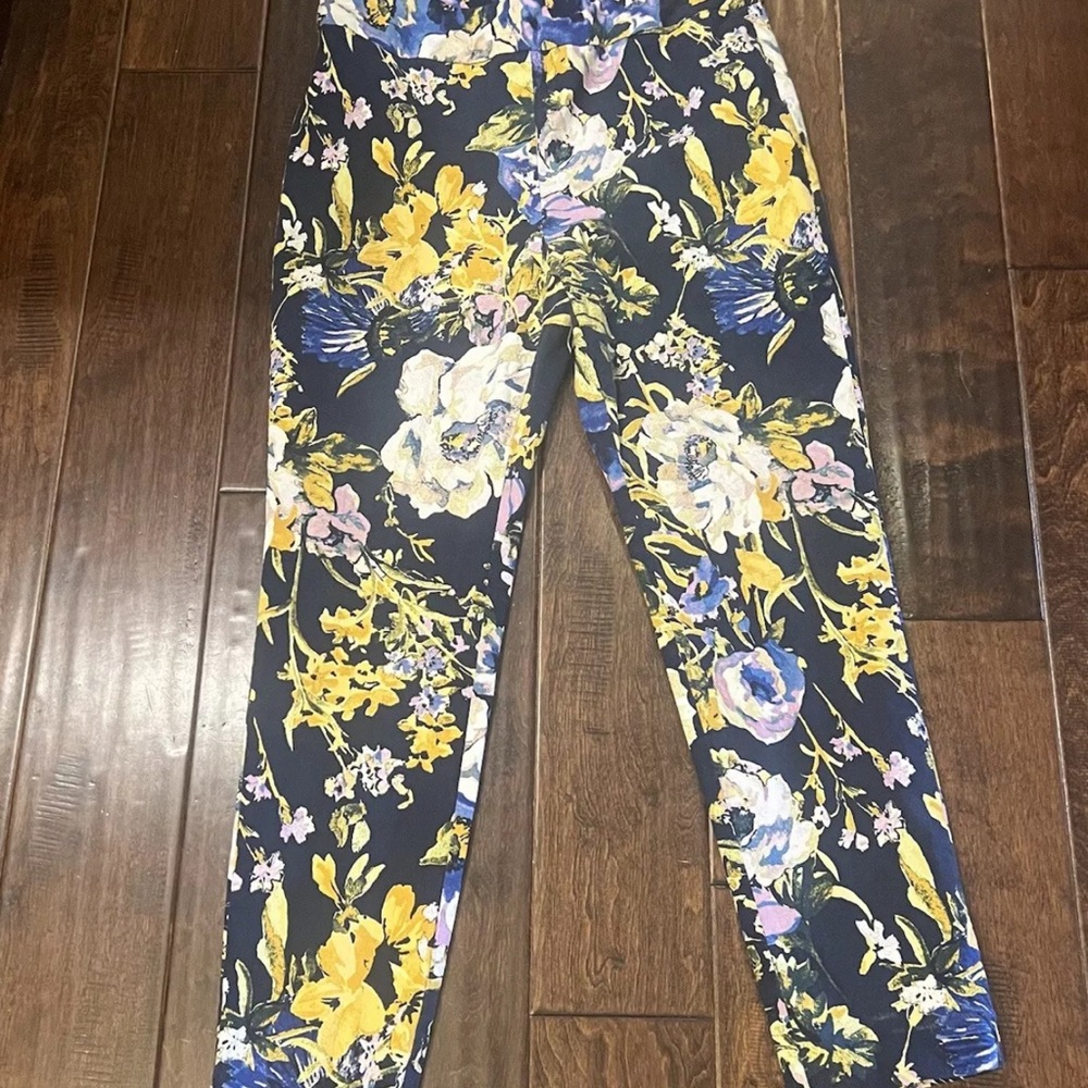 Chicos So Slimming Crop Pants Size  1.5 Floral Design With Navy Blue Back Ground